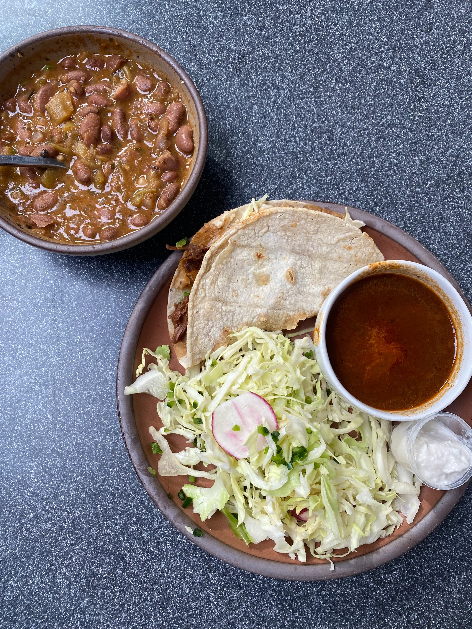 Image may contain Food Food Presentation Meat Mutton Plate Cup and Bread