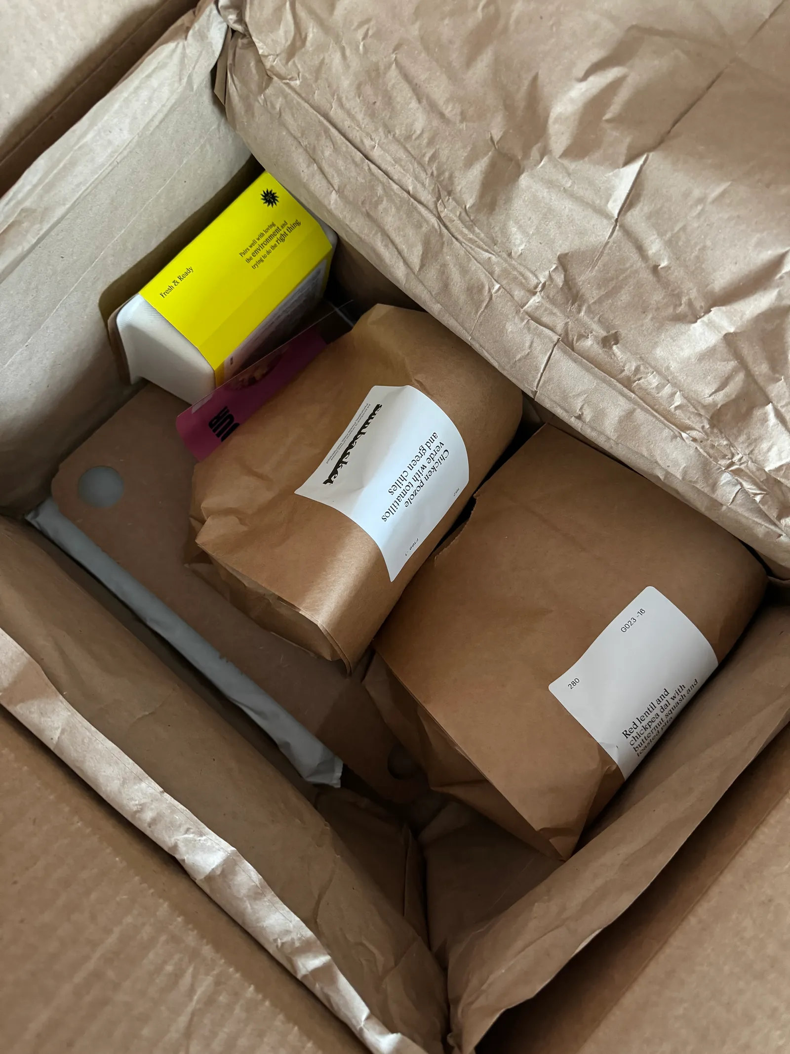 Image may contain Box Cardboard Carton Package Package Delivery Person Bed and Furniture